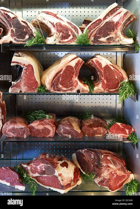 Display Of Dry Aged Meat In Butchers Shop Stock Photo Alamy