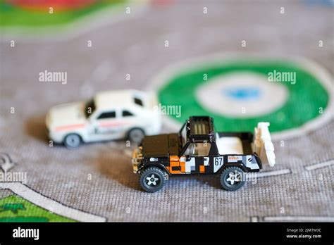 A Mix Of Hot Wheels Toy Model Cars On A Play Road Stock Photo Alamy