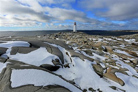 Peggys Point Lighthouse In Winter Peggys Cove Nova Scotia C Photograph By Gary Corbett