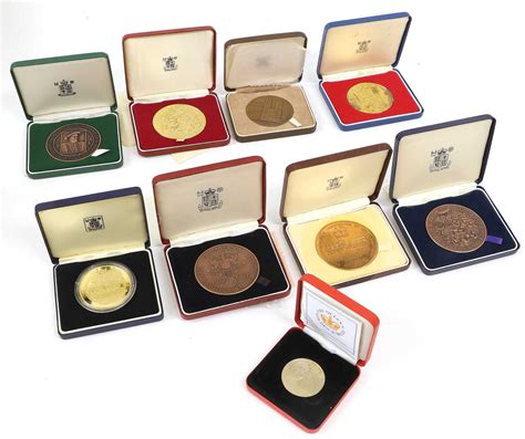 Lot 424 - 9x Royal Mint Commemorative Medals; silver,