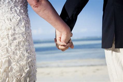 Wedding Couple Holding Hands during Wedding Ceremony. Stock Photo ...