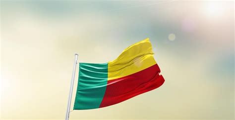 Premium Photo Benin National Flag Waving In Beautiful Sky