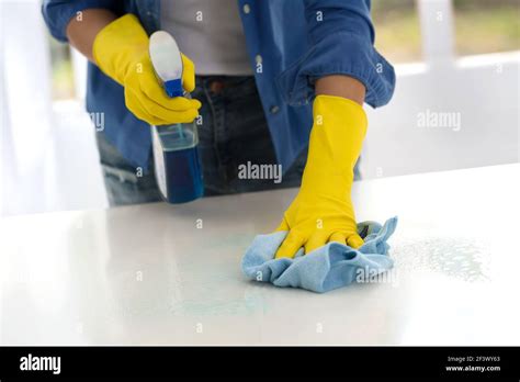 Worth Girl Cleaning The Table With Mop Stock Photo Alamy