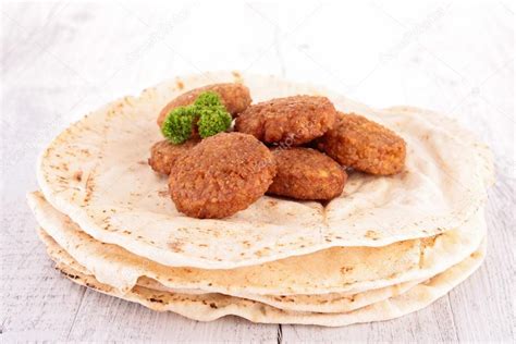 Pita bread and falafel — Stock Photo © studioM #23878649