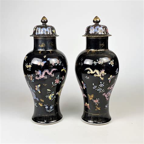 A Striking Pair Of Th Century Black Glazed Porcelain Chinese Vases