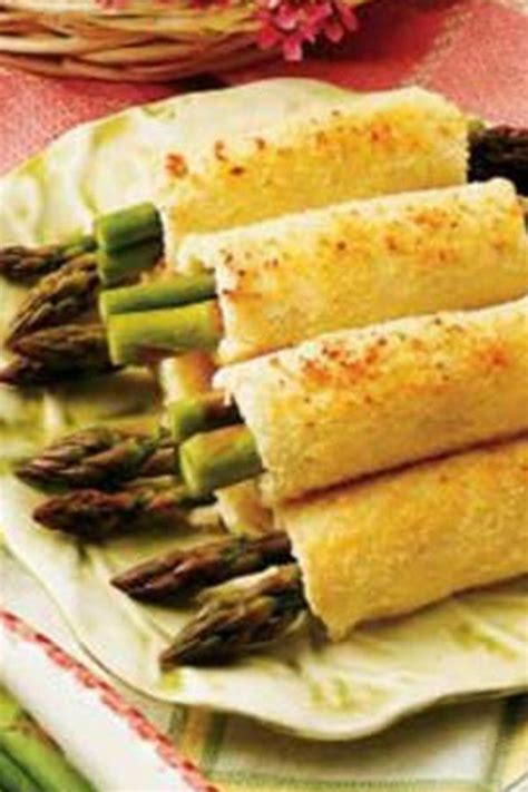 asparagus wrapped in bread on a plate