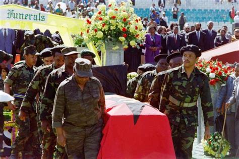 Members of Umkhonto we Sizwe, the ANC military wing , carry the coffin ...