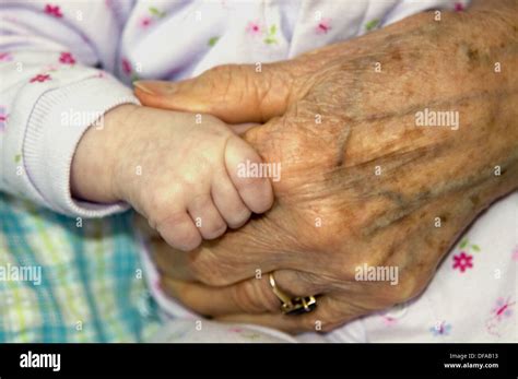 Old Baby Hands Touching Hi Res Stock Photography And Images Alamy