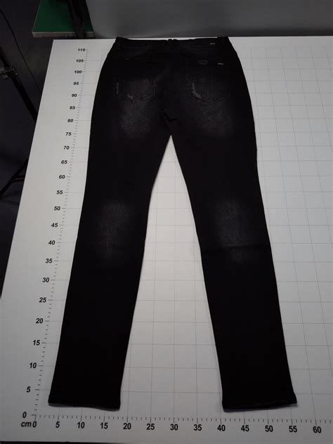 Qc Amiri Jeans Amiri Varsity Patch Jeans In Antique Black From