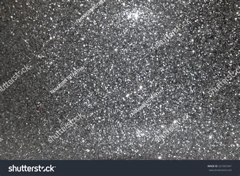 silver glitter background black bokeh abstract stock photo
