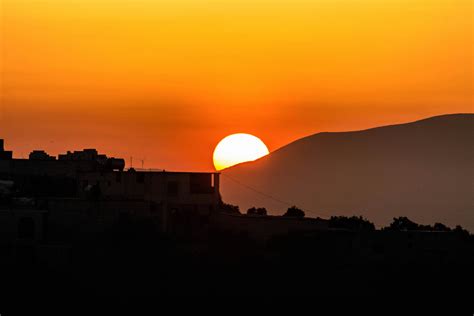 Silhouette of Mountain During Sunset · Free Stock Photo