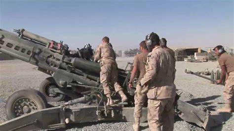 Canadian Forces Artillery Soldiers Firing A Howitzer In Afghanistan