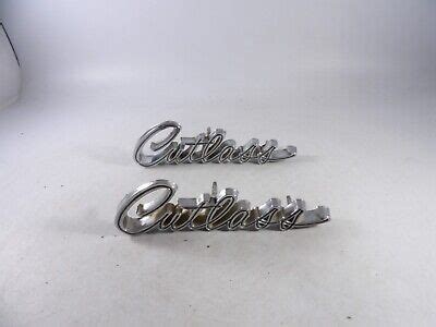 Pair Of Olds Cutlass S Gm Fender Script Emblems Ebay