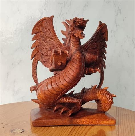 The Winged Dragon Statue Is Made Of Natural Wood Dragon Statue Wood Carving Dragon Statue