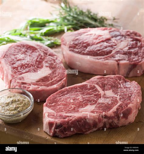 Raw Ribeye Steaks Stock Photo Alamy