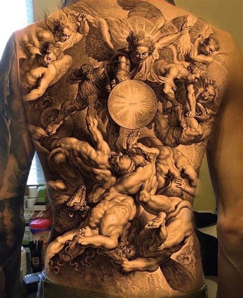 The Back Of A Man S Body With Many Different Images On It Including Cherub