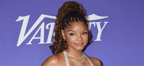 Halle Bailey Shows Off Her Beach Bum In New Seaside Photos