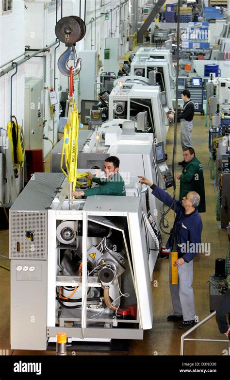 Employees Of The Gildemeister AG Work In The Assembly Hall In Bielefeld