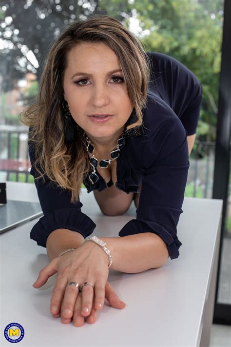 Beautiful MILF Olga Love Teasing Nude In Stockings In A Sexy Home