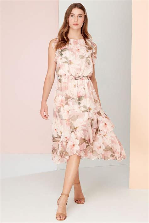 Flirt With Frills In This Gorgeous Floaty Midi Dress Adorned In A