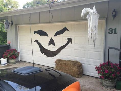 Halloween Garage Decoration with Pumpkins and Bats