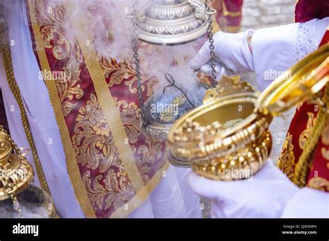 Detail Of The Hand Of An Altar Boy Or Acolyte In A Holy Week Procession