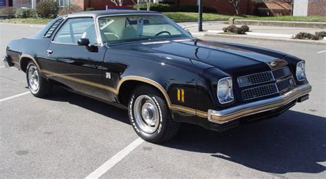 1976 Chevrolet Laguna S-3 in black with gold trim and striping ...