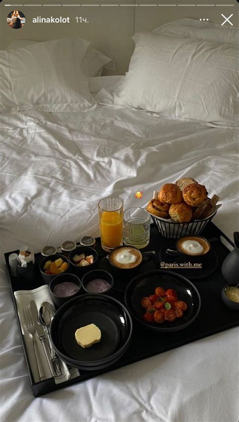 A Tray That Has Food On Top Of It And Drinks In Front Of The Tray