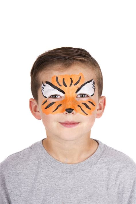 Young Boy Wearing Tiger Carnival Face Paint Stock Photo - Image: 54053347