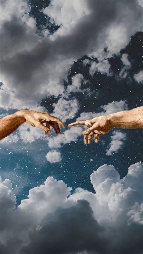 Two Hands Reaching Out Towards Each Other In Front Of Cloudy Sky With