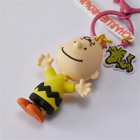 Llavero Snoopy Charlie — Miniso Uruguay