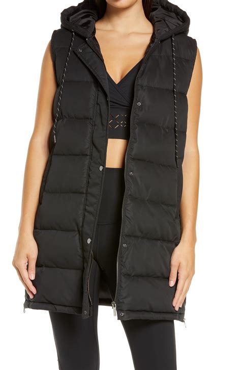 Zella Long Hooded Puffer Vest In Black Lyst