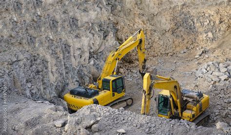 Backhoe - Digging a Trench Excavator digs the foundation for water ...