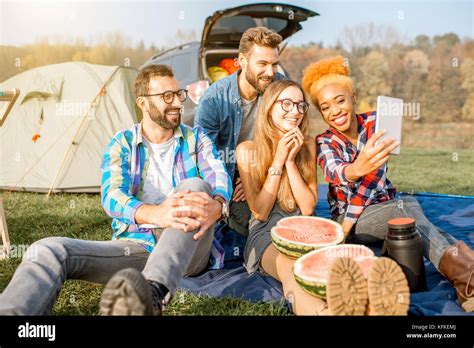 Friends during the outdoor recreation Stock Photo - Alamy