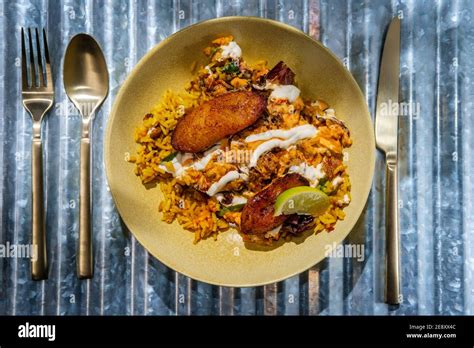 Jamaican Jerk Chicken Rice Bowl With Sweet Plantains And Hot Sauce