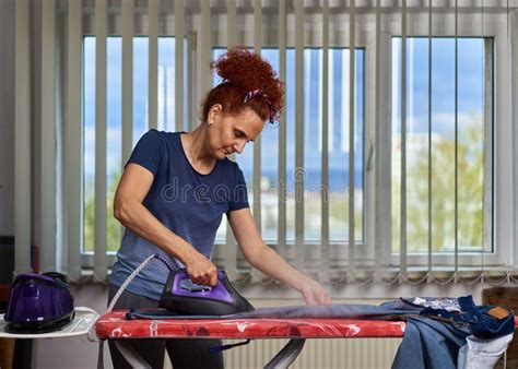 Mature Housewife Ironing Clothes Stock Photo Image Of Headband Mature 274742276