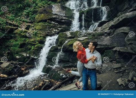 Loving Couple Near A Waterfall In Forest Stock Image Image Of Lake