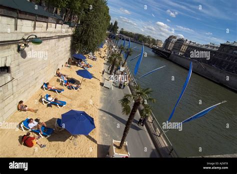 People Enjoying The Artificial Beach During The Summer Paris Plage