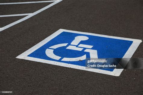 Symbol Of Handicap Parking Area Painted On A Paved Street High-Res ...