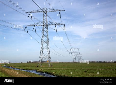 Power Line With Pylons In Dutch Polder Stock Photo Alamy