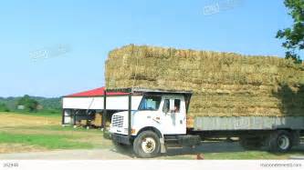 Truck Hauling Hay Bales Stock Video Footage 262948