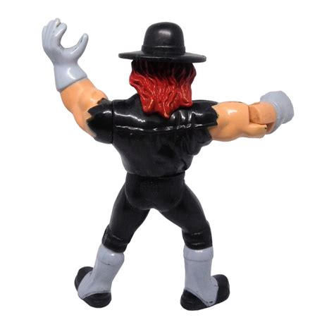 1992 Hasbro WWF Undertaker Action Figure with Tombstone Tackle Action