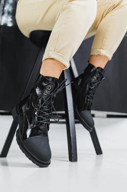 Premium Photo | Black leather boots on women's legs new collection of ...