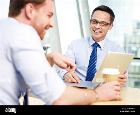 business people talking in office Stock Photo - Alamy