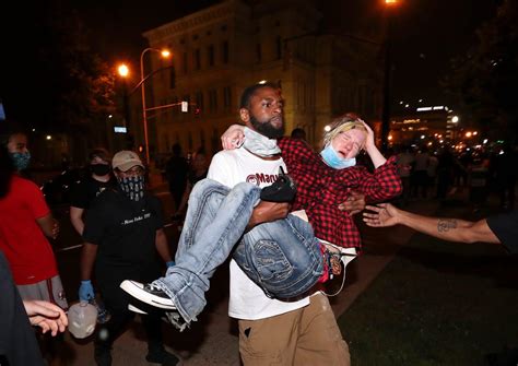 Injured Woman Being Carried To Safety In Louisville R Pics