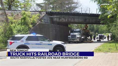 Truck Hits Railroad Bridge Youtube