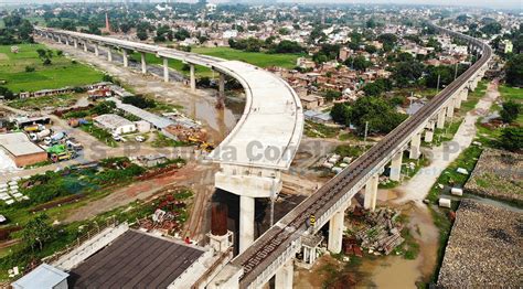 Construction of road approaches to rail cum road bridge across river ...