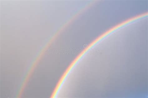 Double rainbow in the sky stock photo. Image of gray - 221958132