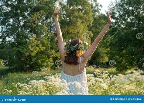 Beautiful Brunette Woman In Flower Wreath Summer Solstice Day