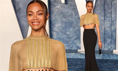 Zoe Saldana Goes Braless In A Sheer Top At Vanity Fair Oscars Bash